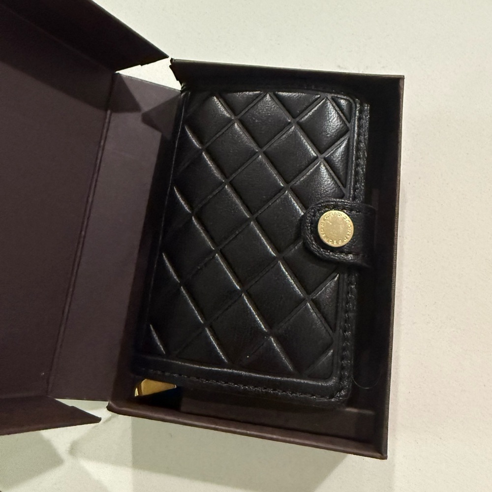 Secrid Mini Black Quilted Wallet with Gold Buttons